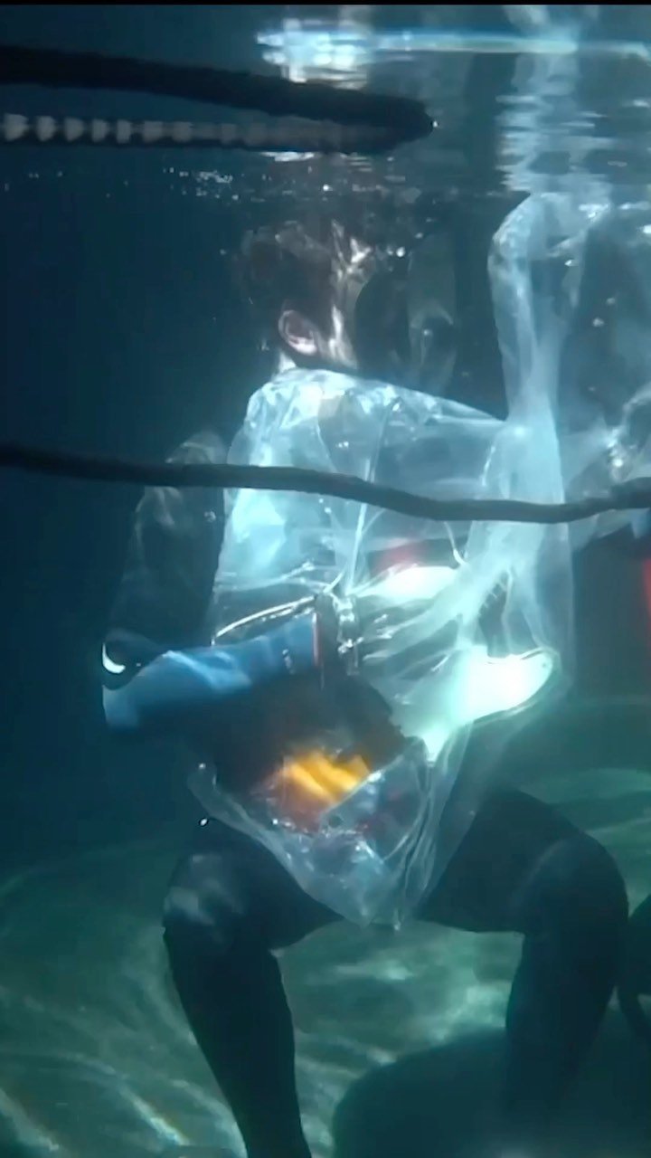 Blake McLain recording guitar underwater for Mirage